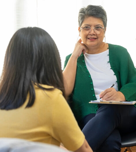 Woman talking to a behavioral health care provider